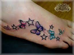 Swirls And Shooting Stars Tattoos Butterfly Tat Ifollowpics Butterfly Tattoos For Women Butterfly Foot Tattoo Tattoos For Women