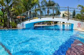 Obtenha um segundo vídeo stock com 7.658 segundos de a bridge over a pool a 59.94fps. Stone Bridge Over The Outdoor Pool Stock Photo Picture And Royalty Free Image Image 83091286
