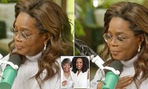 Christina Perry covers up tattoos to play robot in Human music video