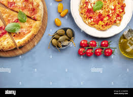 Italian Food Background Pizza Pasta Tomatoes Capers Etc Shot From The Top With Copy Space A Flatlay Design Template Stock Photo Alamy