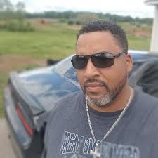 What could be the issue with low coolant levels after a flush?