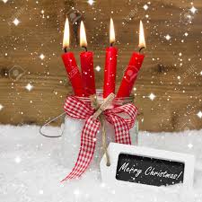 Snowy Merry Christmas Four Red Burning Candles With Bow And Stock Photo Picture And Royalty Free Image Image 22775280