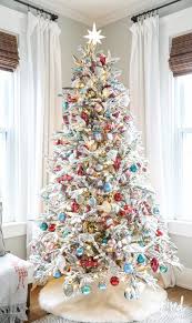 Flocked Christmas Tree Decorations Country Flocked Modern C Flocked Christmas Trees Decorated Christmas Tree With Coloured Lights Creative Christmas Trees