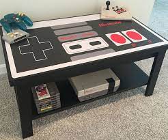 I saw a few nes tables around the internet and fell in love with the idea. Retro Nes Controller Coffee Table