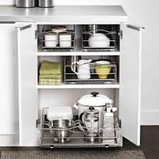 Designed for 9 and 12 narrow cabinets, this cabinet organizer features 5 tiers of storage space including 3 adjustable shelves. 9 Inch Pull Out Cabinet Organizer Simplehuman