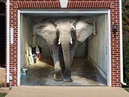 Thankfully, painting a garage door is a simple diy job, as long as you pick the right paint. Elephantgarage Garage Doors Garage Door Paint Door Murals