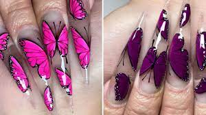 Light pink butterfly nail design pinterest purple butterfly nail design with leopard prints pinterest Nail Artist Creates Color Changing Butterfly Manicure See Photo Allure