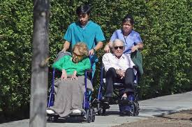 Anne buydens and kirk douglas had been married since may 29, 1954. Kirk Douglas 101 And Wife Anne Buydens 99 Enjoy Fresh Air In Matching Wheelchairs Mirror Online