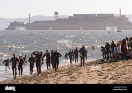 Swimmers emerge from San Francisco Bay during the 30th Anniversary Escape  from Alcatraz triathlon in San Francisco, California, on Sunday, May 2,  2010. (Photo by D. Ross CameronContra Costa TimesMCTSipa USA Stock
