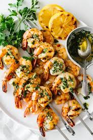 Pour the lukewarm sauce into the bag, seal tightly; Garlic Grilled Shrimp Skewers Downshiftology