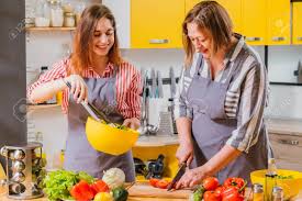 Chocolate birthdays, chocolate anniversary, or just chocolate for the sake of chocola.; Family Culinary Master Class Mother And Daughter Having Fun Stock Photo Picture And Royalty Free Image Image 126435480