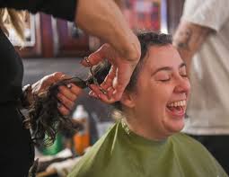 Hundreds attend St. Baldrick's event and shave their heads for childhood  cancer (photos)