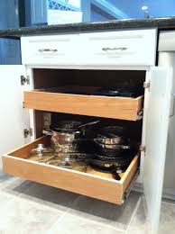 You can remove most drawers by pulling them all the way out, then either lifting or lowering the front of the drawer until the wheels come out of the track. Custom Kitchen Cabinet Refacing Kitchen Saver