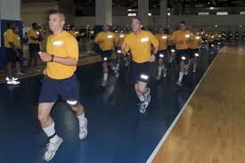 Recruits Run During A Physical Fitness Assessment In The Freedom Hall Physical Fitness Facility At Recruit Training Boot Camp Workout Fitness Studio Navy Boots