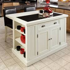 The island design is pretty simple: Distressed White Board Kitchen Island With Drop Leaf Breakfast Bar Handy