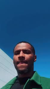 Tamia Line Dance Guy in Orange Shirt