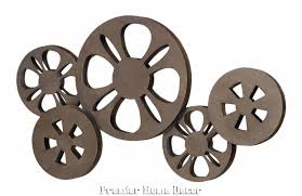 This listing is for a set of three wall prints. Movie Reel Wall Decor Easy To Diy Using Cardboard A Faux Finish Movie Reel Decor Movie Room Decor Affordable Wall Decor