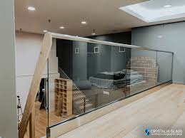 The channel can be concealed below finished floor levels and is used extensively where balustrades are mounted close to edges of balconies. Glass Balustrade For A Two Level Apartment Glass Staircase Railing Balcony Design Interior Railing