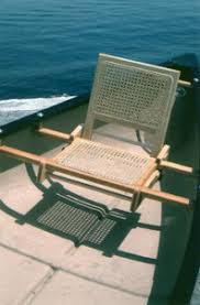 The seat is constructed from a single piece of fabric that is folded into a simple box. Portable Slide On Cane Backrest For Canoe Seat