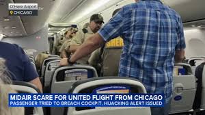 United flight diverted to Madison: Man tries to breach cockpit of United Airlines flight 2005 from Chicago, forces hijacking alert