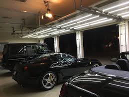 Luxury Car Garage With Our Garage Door Lighting Kits Garage Door Lights Garage Design Luxury Car Garage