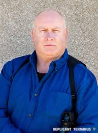 Noel “Torch” Alan Bellator, Office of Replicant Safety, Blade Runner  Officer #409, played by Sir. Greg. Lartu Vox Replicant Terminus, a Myelin  Productions project. Written and directed by Sir. Greg.