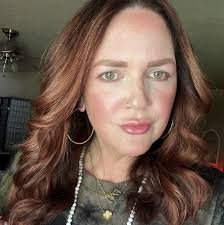 Did Bella's lip get bruised from the baseball challenge?