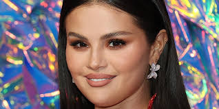 Selena Gomez Matches Rosebud Tatt With Chic Updo