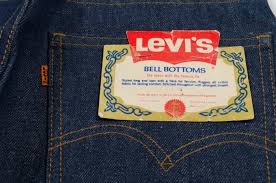 Often made of denim, they flared out from the bottom of the calf, and had slightly curved hems and a circumference of 18 inches (46 cm) at the bottom of each leg opening. Peace Love Bell Bottoms Celebrating 50 Years Of An Iconic Style Levi Strauss Co Levi Strauss Co