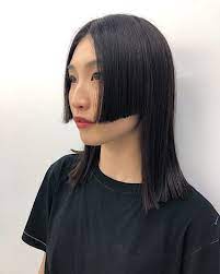 The Step Mullet Is The Next Big Hair Trend Mullet Hairstyle Asian Short Hair Curly Hair Styles
