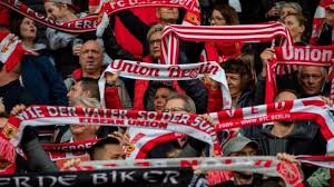 Berlin (ap) — a small group of union berlin fans cheered their side on from the trees outside the stadium on tuesday as it secured another season in the bundesliga. Union Berlin The German Fans Who Bleed For Their Club Nigeriasoccernet News