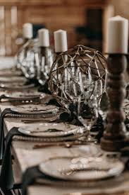 Drape the fabric from one side of ceiling to the other, hanging it over a higher center point if possible to create a pointed look as shown above. Wedding Inspiration Moody Gothic Rustic Wedding In Nashville Tn Industrial Wedding Table Decorations Industrial Wedding Industrial Wedding Table