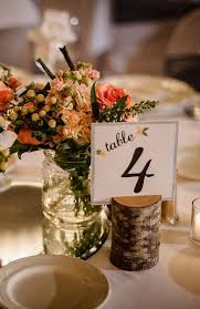 Cute Rustic Table Number Floral Centerpiece Pairing Photo By Gray Photography Via Project Wedding Fall Wedding Centerpieces