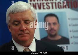 Attorney General Tom Corbett holds a news conference, Tuesday, Dec. 15,  2009, in Harrisburg, Pa. Corbett says state Rep. Bill DeWeese, D- Greene,  and former Revenue Secretary Stephen Stetler and an aide