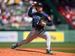 Seattle Mariners starting pitcher Bryan Woo (22) pitches against the Boston Red Sox at Fenway Park in Boston, Massachusetts.