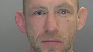 Man who drove his car at police jailed for more than 13 years