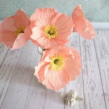 Cut notches along one long edge of the doubled paper to make fringe. Where To Buy Crepe Paper Flowers On Etsy Happy Happy Nester
