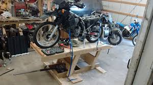 Sloped, to facilitate mounting the motorcycle on the lift, and flat, to serve as a work surface after pivoting. Diy Motorcycle Lift Page 7 Adventure Rider