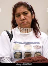 Julieta Gonzalez, left, mother of Jennifer Robles who disappeared in May  from a Mexico City nightclub, shown