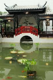 A Chinese Style Garden With Viewing Pavilion Red Bridge Over Fish Pond In Guangzhou Chi China Architecture Chinese Architecture Ancient Chinese Architecture