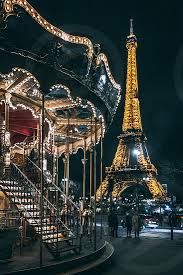 Let the sun set in the city of love on your keyboard. Paris Night Eiffel Tower Carousel Lights Winter France By Patricia Palacin Photo Stock Snapwire