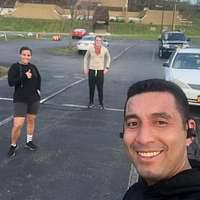 An Airman traverses the inversed ladder obstacle during