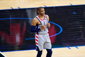 An irate russell westbrook had to be restrained after getting popcorn dumped on him by a fan as he was leaving the court in philadelphia. Cg7yyafxakvihm