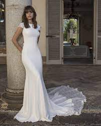 If you're envisioning a simple yet elegant wedding gown featuring clean lines and zero fuss, browse our selection of plain wedding gowns. Simple Wedding Dresses For Elegant Brides