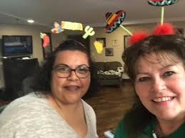 Elsa Topete and baby Joel came in for our Caregivers brunch this morning.  Elsa won a Monster drink for dressing up every day this week!