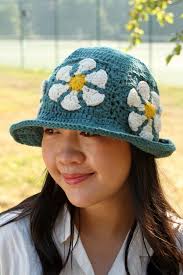 Pachamama® teal daisy bucket hat