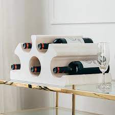 Each of these racks is from the finest names in the market and will never disappoint you in any way. Modern Crown Shaped Kraft Wine Rack Freestanding
