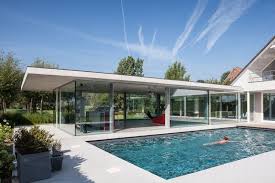 Glass And Concrete Pool House In Belgium Pool Houses Courtyard House Plans Glass Pool