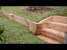 It could also be implemented on multiple levels as shown. Easy Diy Retaining Wall Diy Retaining Wall Landscaping Retaining Walls Wood Retaining Wall