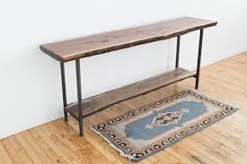 A sturdy foyer table provides a convenient place for everything from purses to decorative items. Live Edge Entryway Table Black Walnut Console Stockton Heritage
